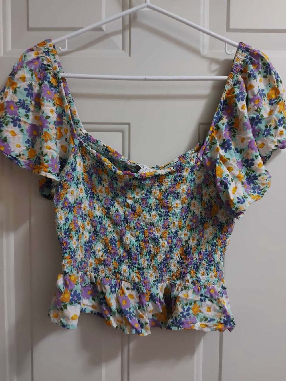 Turquoise floral smocked short sleeve top